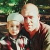 Andrei Krasko with his younger son Kirill (57 kB)